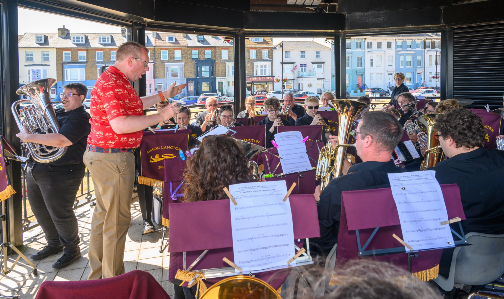Simon Langton Brass and conductor performing at Deal Bandstand