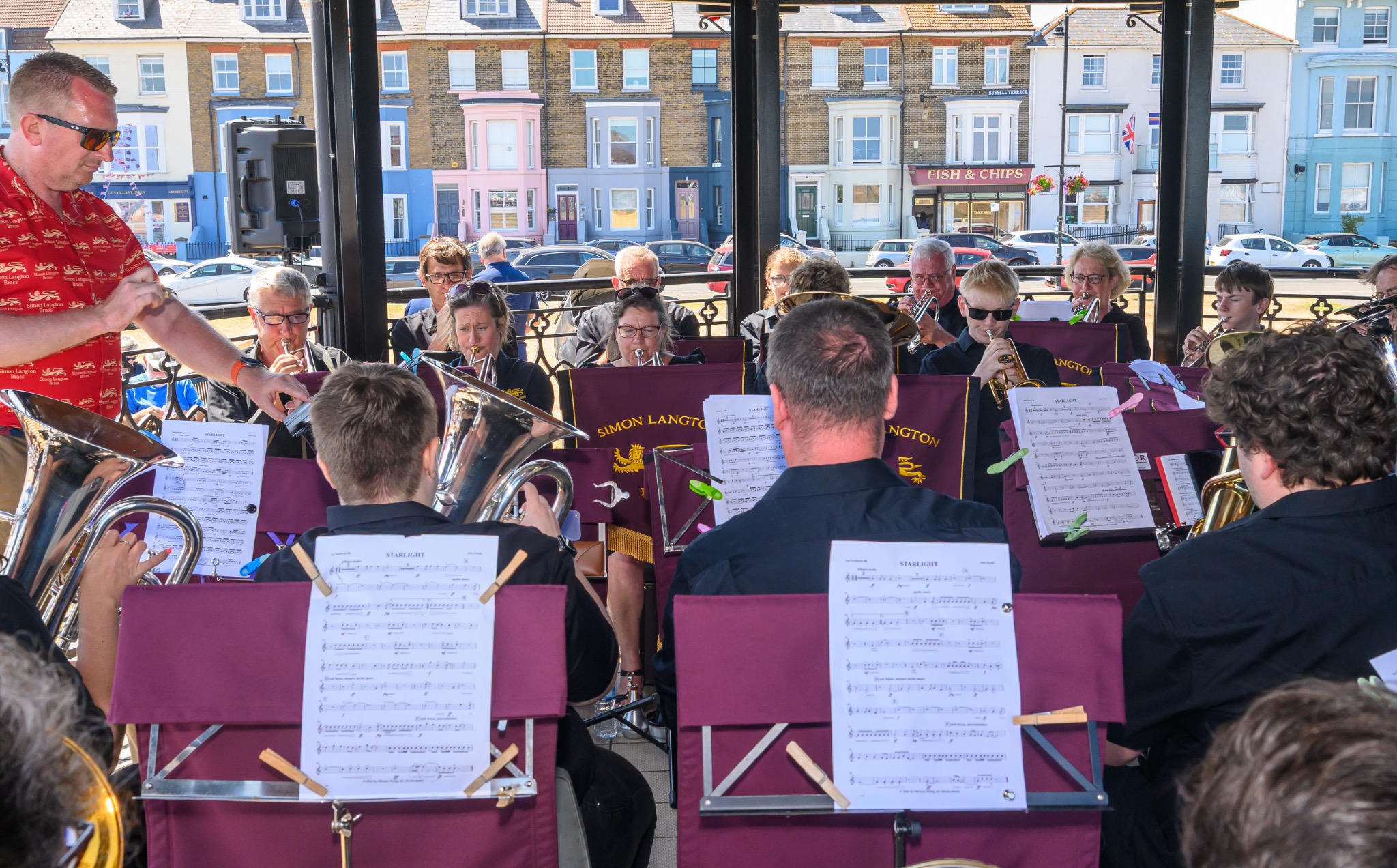 Simon Langton Brass playing together at Deal Bandstand