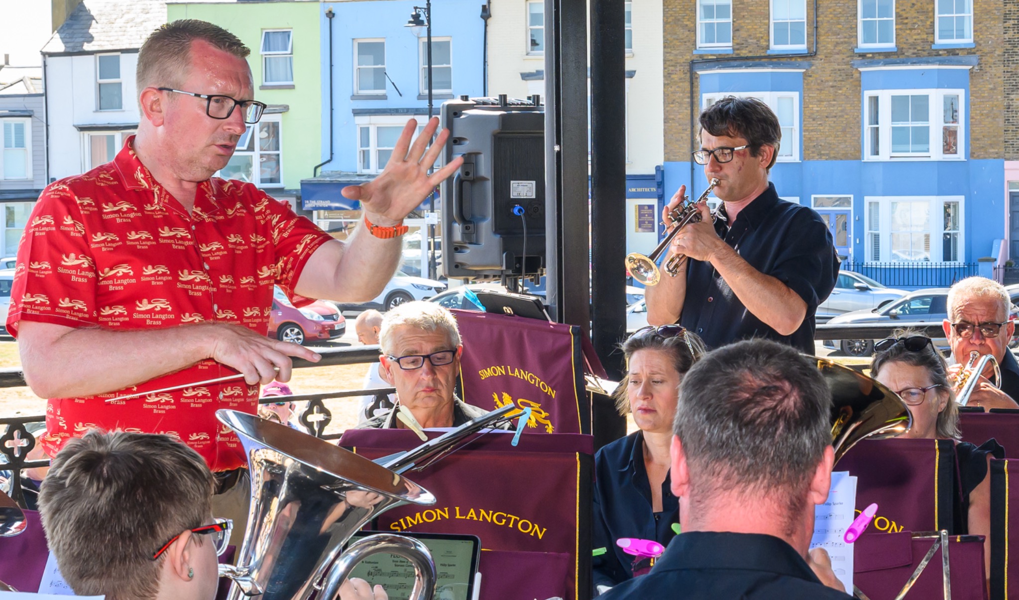 Conductor and cornet soloist performing at Deal Bandstand