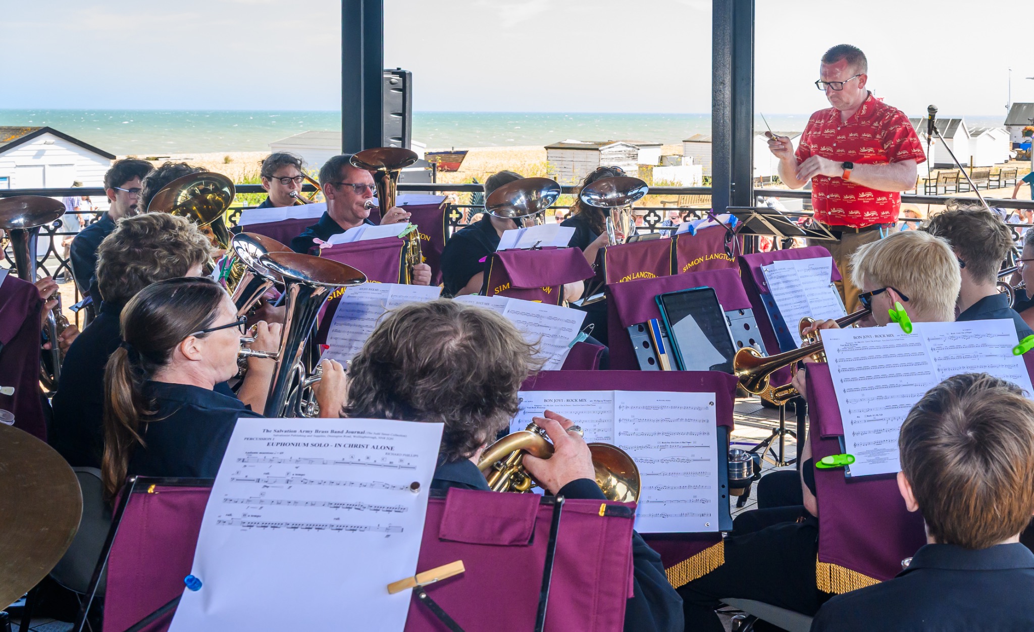 Simon Langton Brass performing at Deal Bandstand with the sea behind