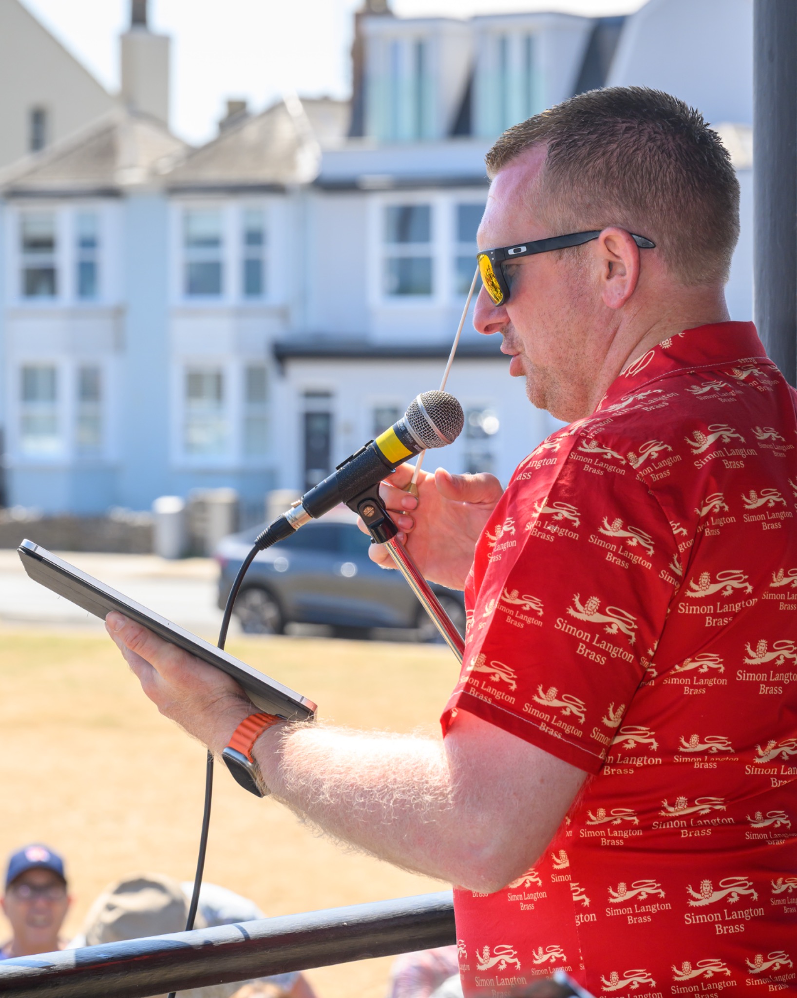 Compere introducing the concert at Deal Bandstand
