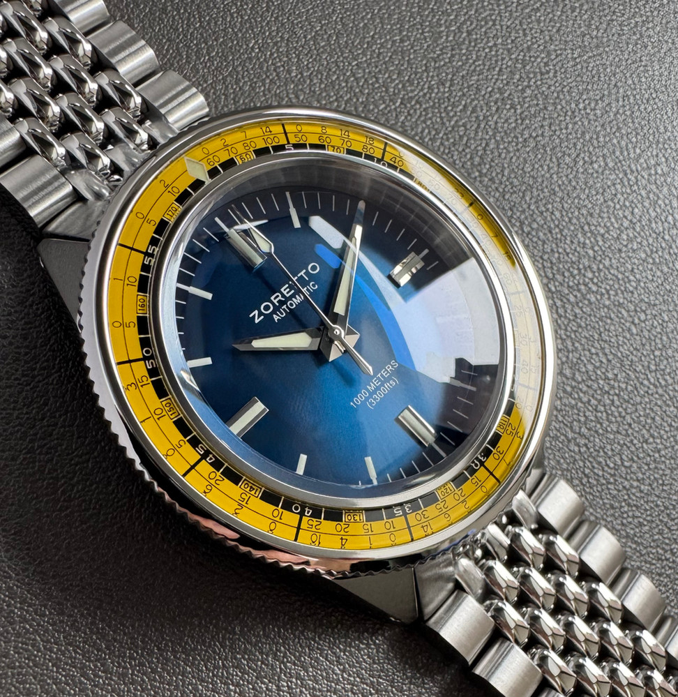 Jota 40 Blue Dial Yellow Bezel
