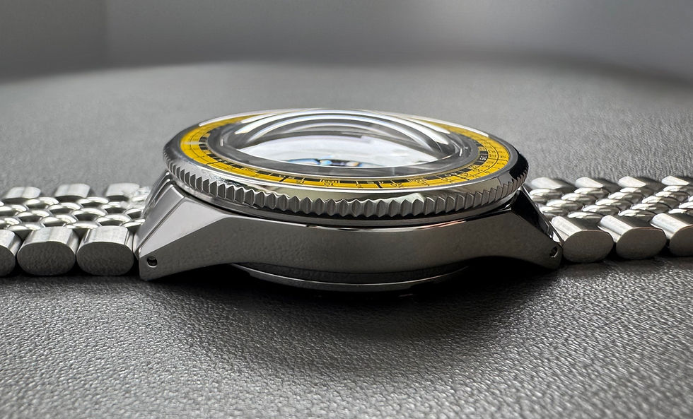 Thumbnail: Jota 40 blue dial yellow bezel