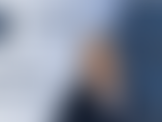 Blonde woman smiling, with text about "The Briefing" on SiriusXM POTUS and "Brewing Trade War?" discussing U.S.-EU tariffs. Blue background.