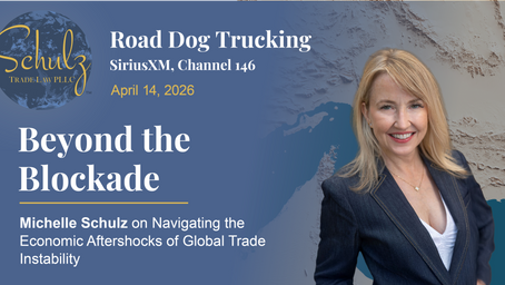 Smiling woman in a suit against a map background. Text: "Beyond the Blockade" and event details for Road Dog Trucking on April 14, 2026.