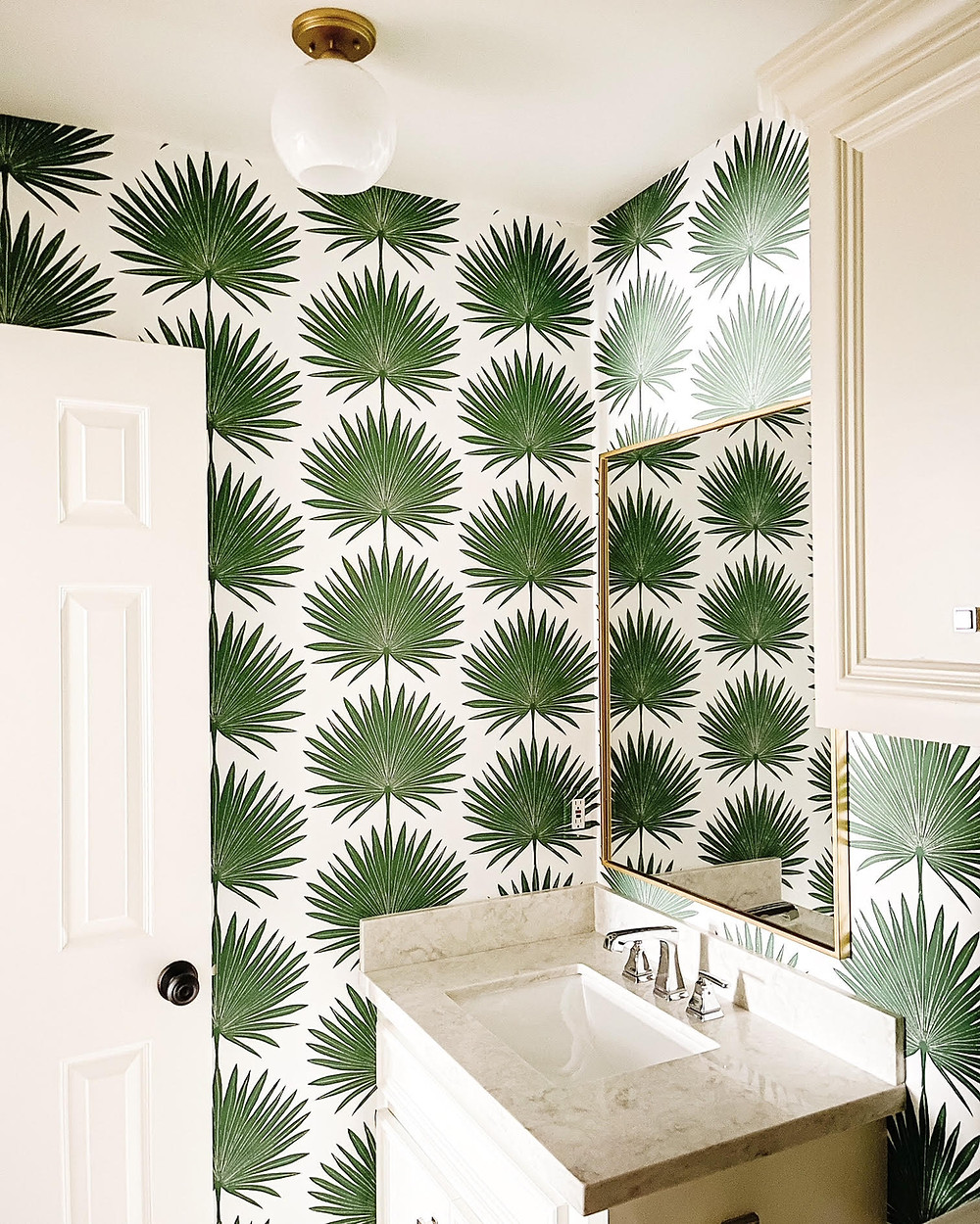Powder room renovation by Houston interior design firm Nancy Lane Interiors.