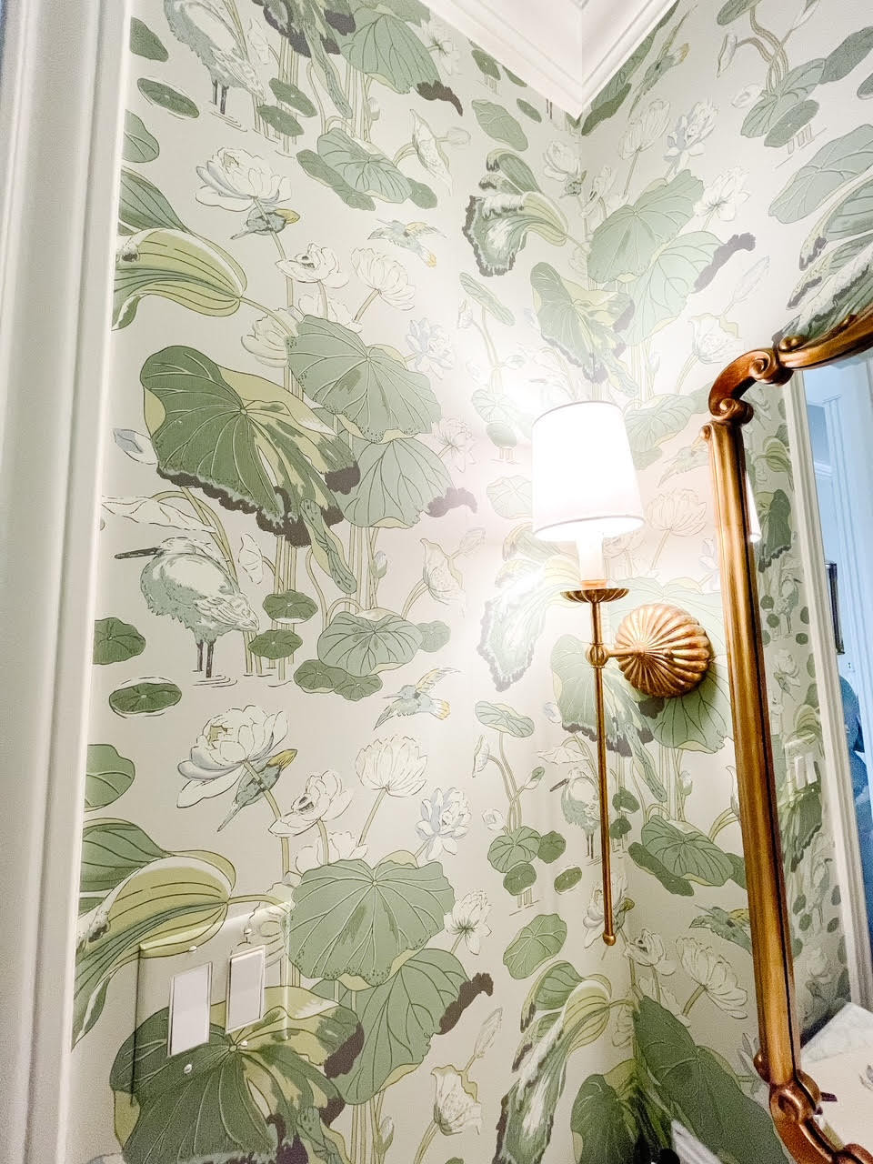 powder room renovation Modern traditional powder room with gorgeous wallpaper by Houston interior design firm Nancy Lane Interiors.
