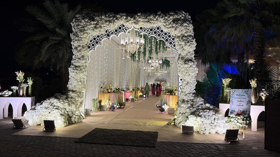 Floral tunnel wedding entrance decoration by Kauvery Events