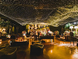 Fairy light rooftop setup for a surprise celebration by Kauvery Events
