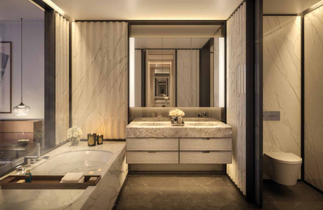 a bathroom with two sinks and a large mirror