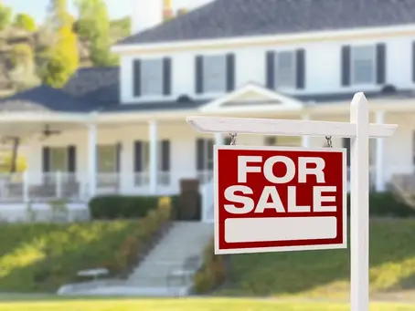 Modern London apartment with bright natural light and staged living room, representing fast and professional UK property sales by Luxe Living International