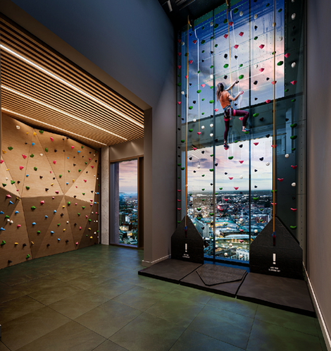an artist 's impression of a person climbing a climbing wall