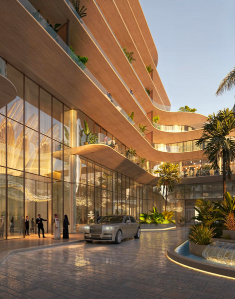 a rolls royce is parked in front of a building