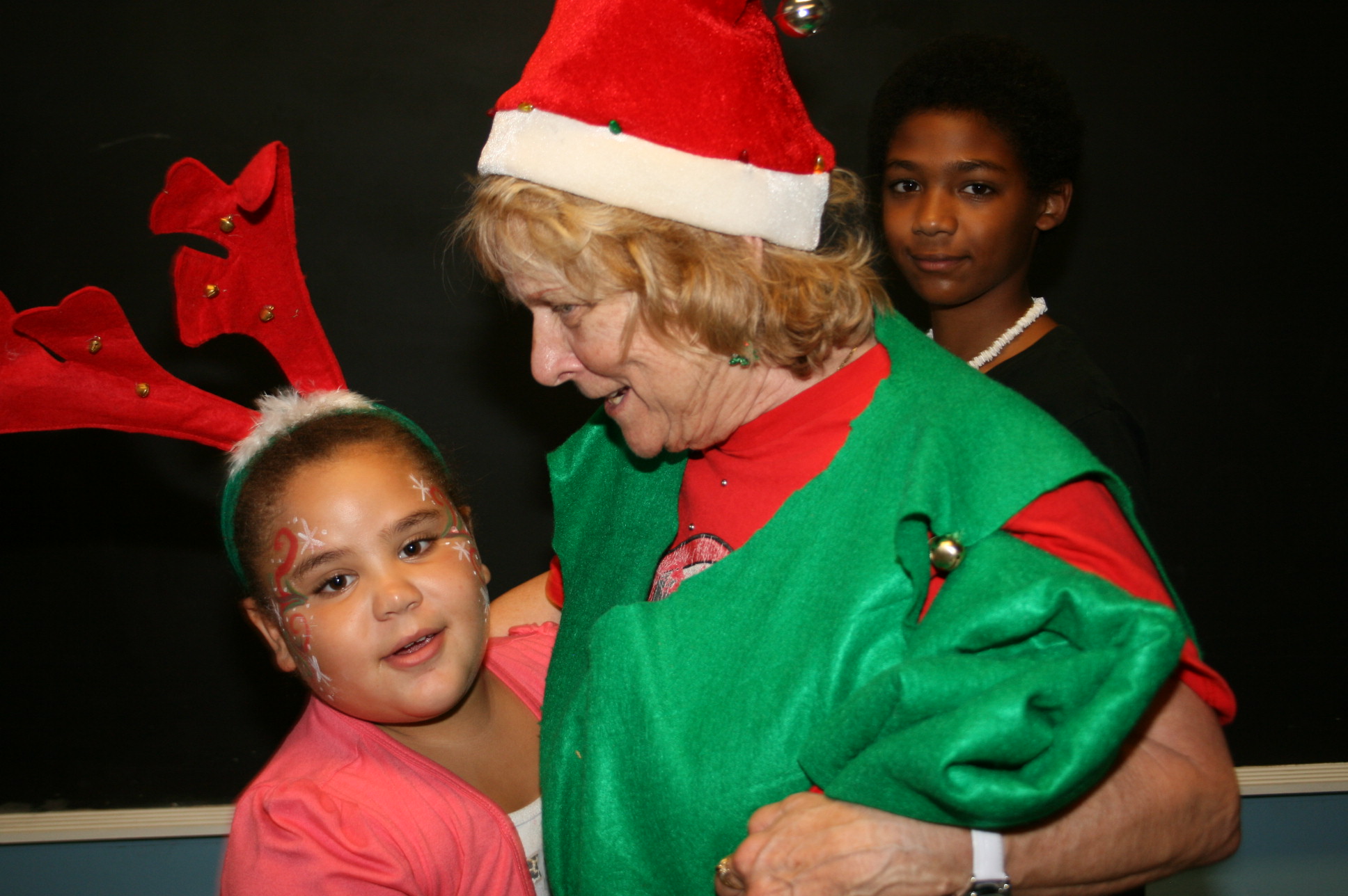 Donnalee hugged by child
