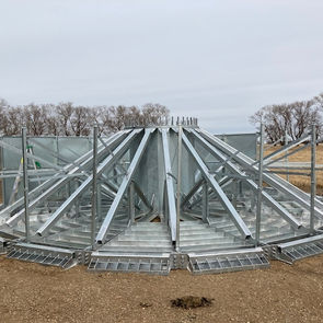 Attach truss arms to king-post and base trays