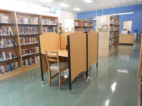 Private workstation with book shelves surrounding