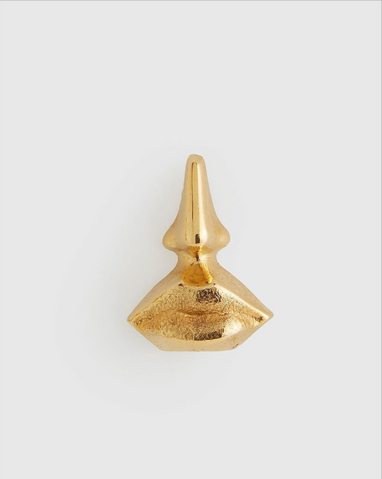 Front view of Surreal Earring showing nose and face facial features in gold-plated bronze