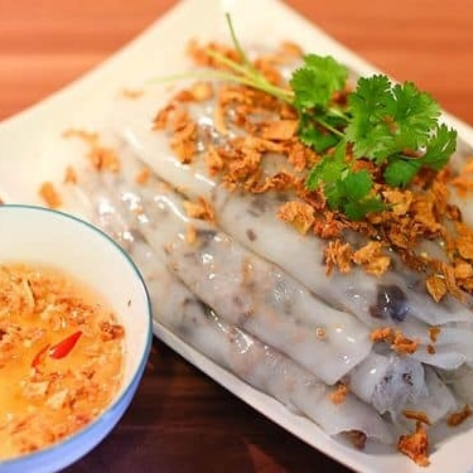 Banh Cuon – Hanoi steamed rice rolls filled with pork, mushroom, and cha lua, served with nuoc cham sauce