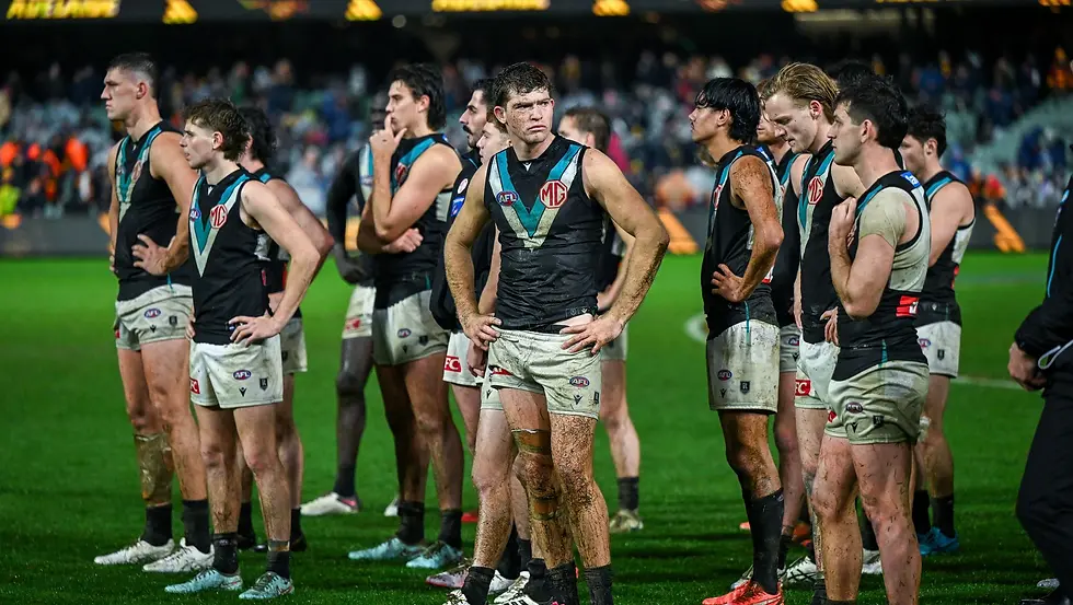 Port Adelaide players left disappointed after a huge loss