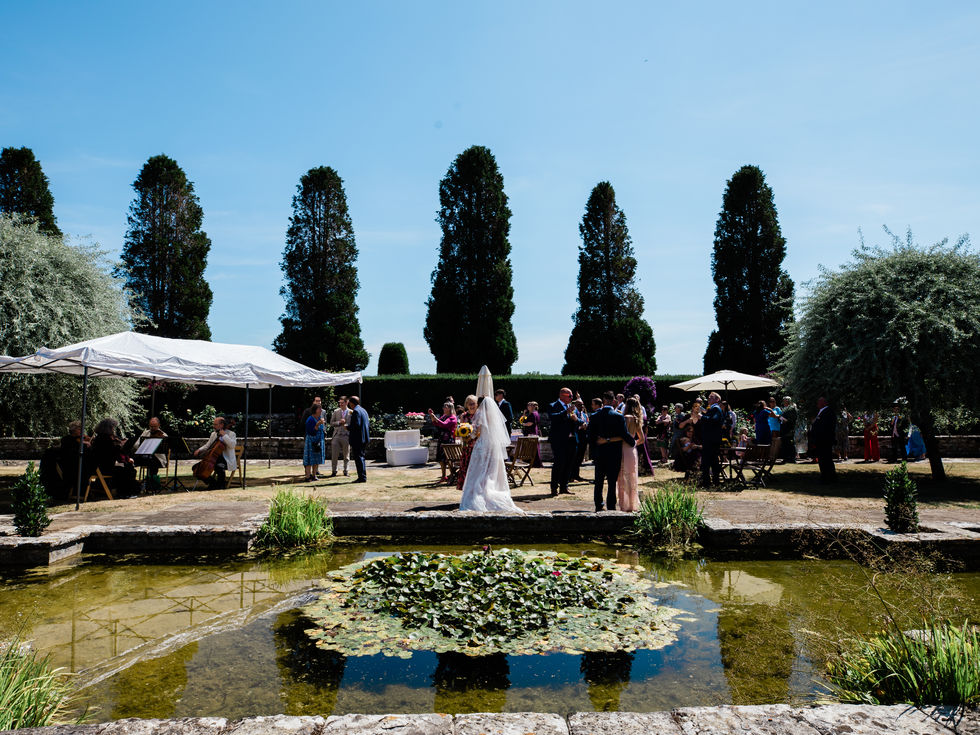 Stone exterior of The Tithe Barn wedding venue at Hinton St Mary Estate in Dorset