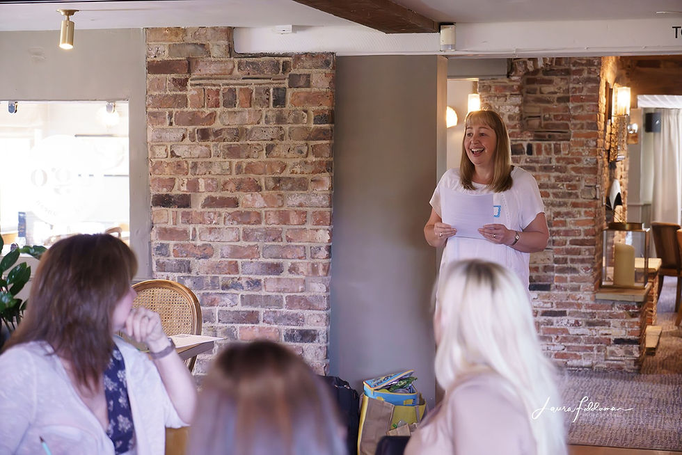 Katie Bowers doing a tapping presentation at a networking event