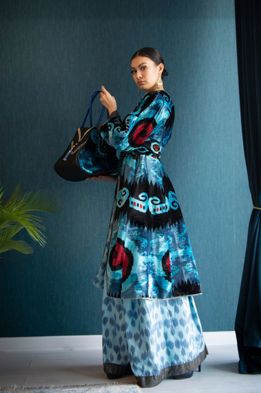 woman wearing a long blue Bibi Hanum Ikat Dress 
