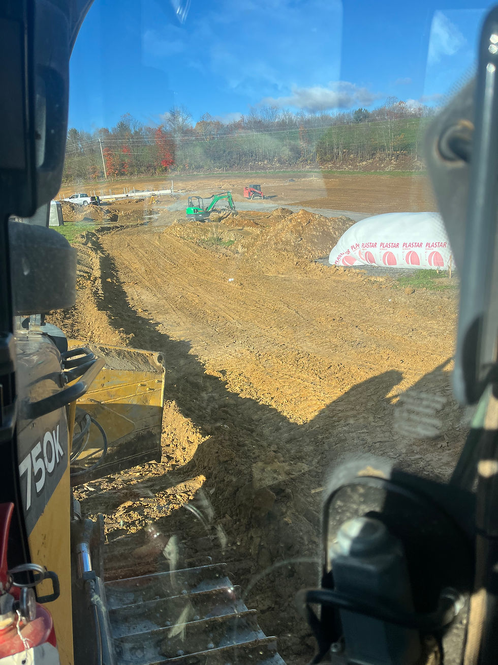 roads being built to a barn