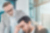 Man showing emotional intelligence with colleague New Reflections Australia