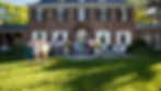 Guests enjoying the rear terrace on a sunny fall afternoon at Waverley Hill. Beneficiary: Allegheny Mountain Institute. Staunton, Virginia.