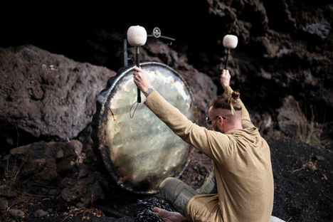 Pauline Fabry activating a MeteoriteGong on Mount Etna during the creation process
