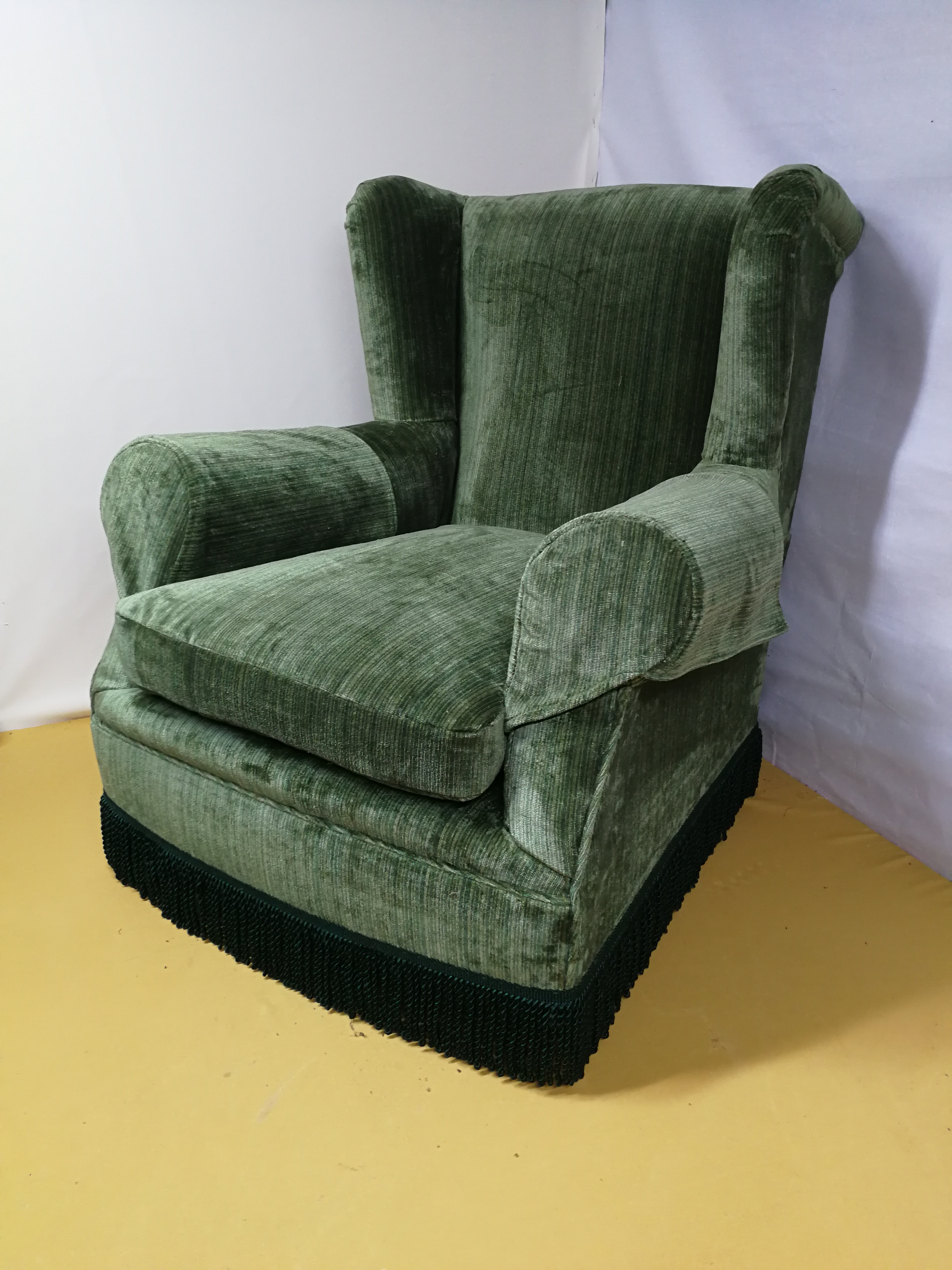 Green velvet arm chair
