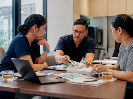 Procurement team reviewing medical supplies
