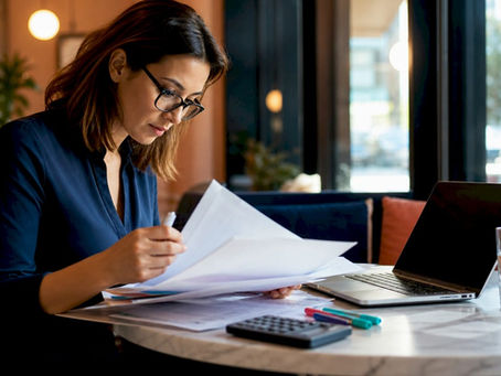 Healthcare administrator reviewing reimbursement codes