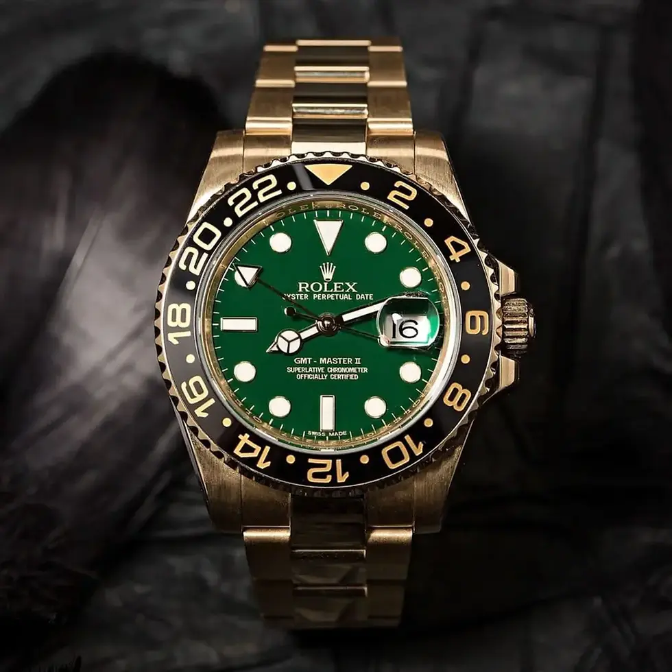 Thumbnail: Rolex GMT-Master II “Green Dial” Yellow Gold