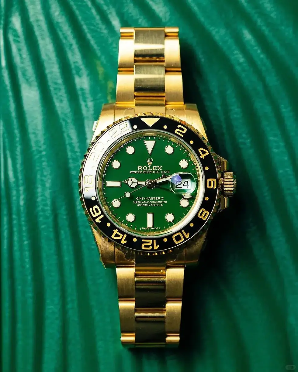 Thumbnail: Rolex GMT-Master II “Green Dial” Yellow Gold