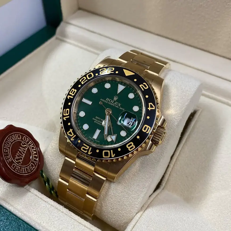 Thumbnail: Rolex GMT-Master II “Green Dial” Yellow Gold