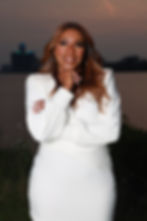Empowered woman representing confidence and personal growth through coaching and motivational tools.