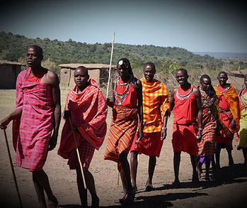 group of people wearing orange and yello