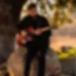 Guitarist performing at Shale Oak Winery