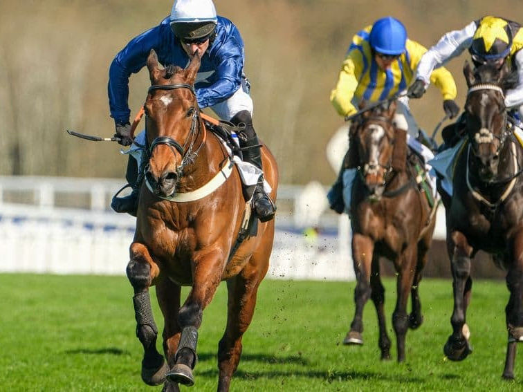 Benvoy galloping clear of two rivals on the run-in