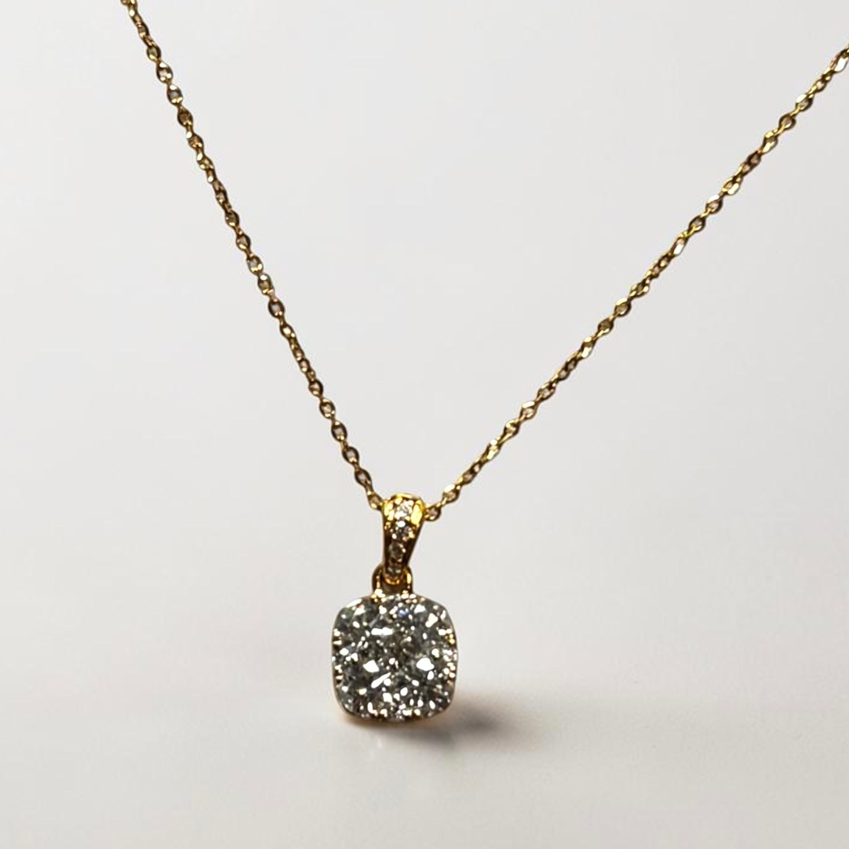 Yellow gold diamond pendant 