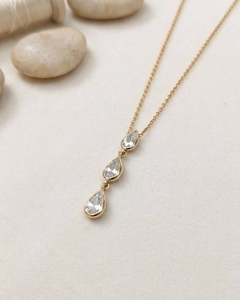 Thumbnail: diamond pendant in 10k gold