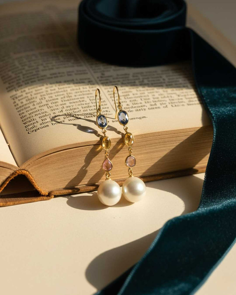 natural pearl drop earrings with colorful sapphires