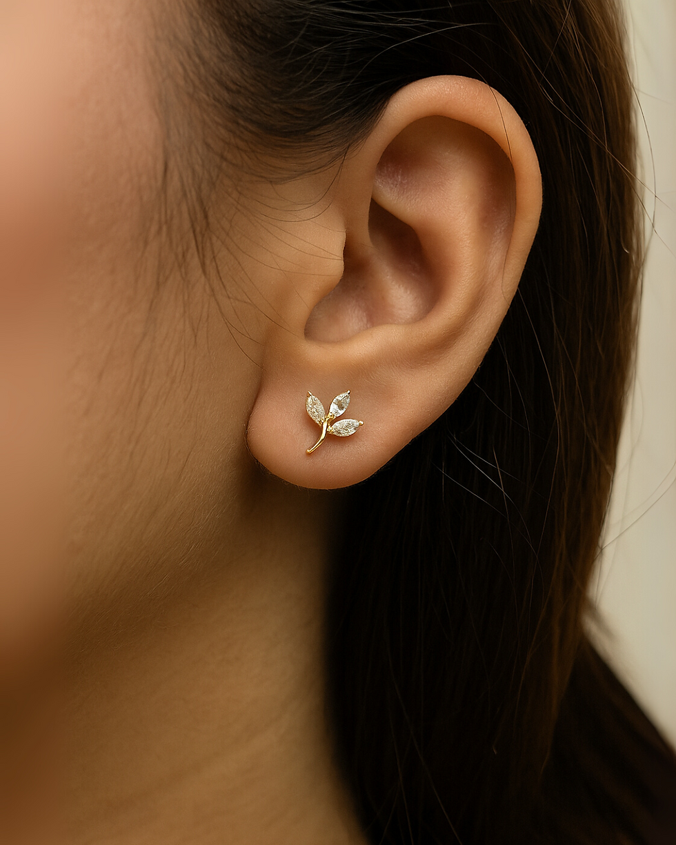 leaf shaped lab grown diamond stud earrings in gold delicate jewelry