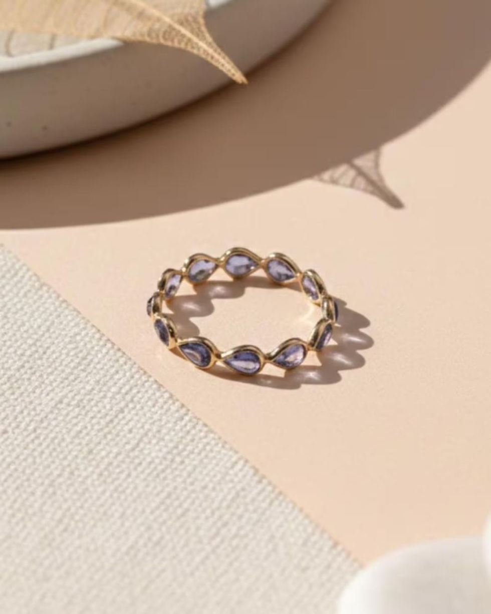 tanzanite pear eternity band gold ring