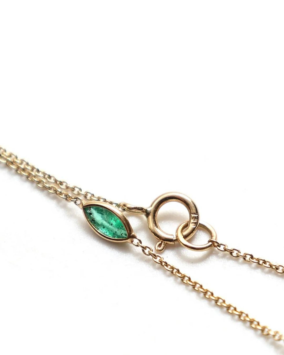 emerald station necklace in 14k gold