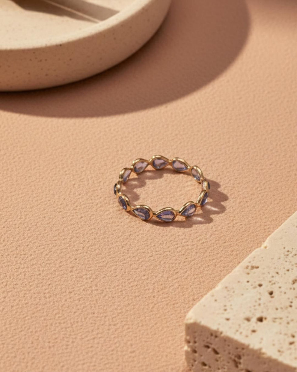Thumbnail: handcrafted tanzanite eternity ring