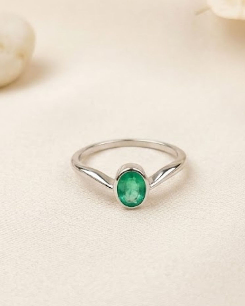 emerald v shape solitaire ring in white gold