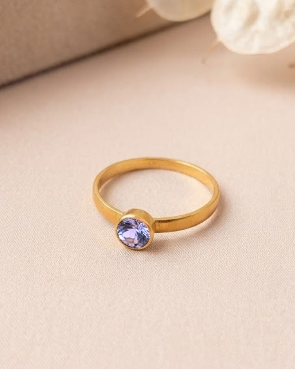 Thumbnail: delicate tanzanite solitaire jewelry