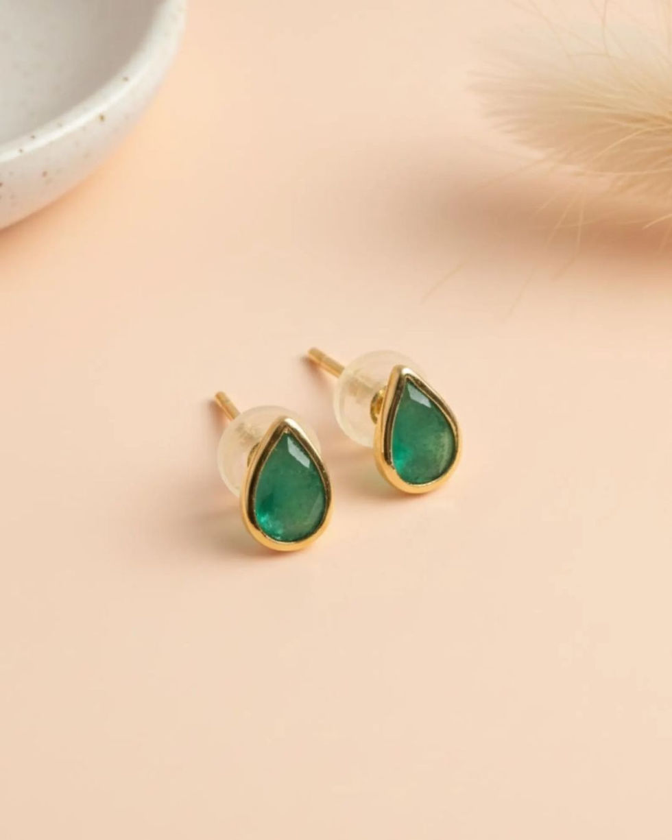 multi piercing emerald earrings